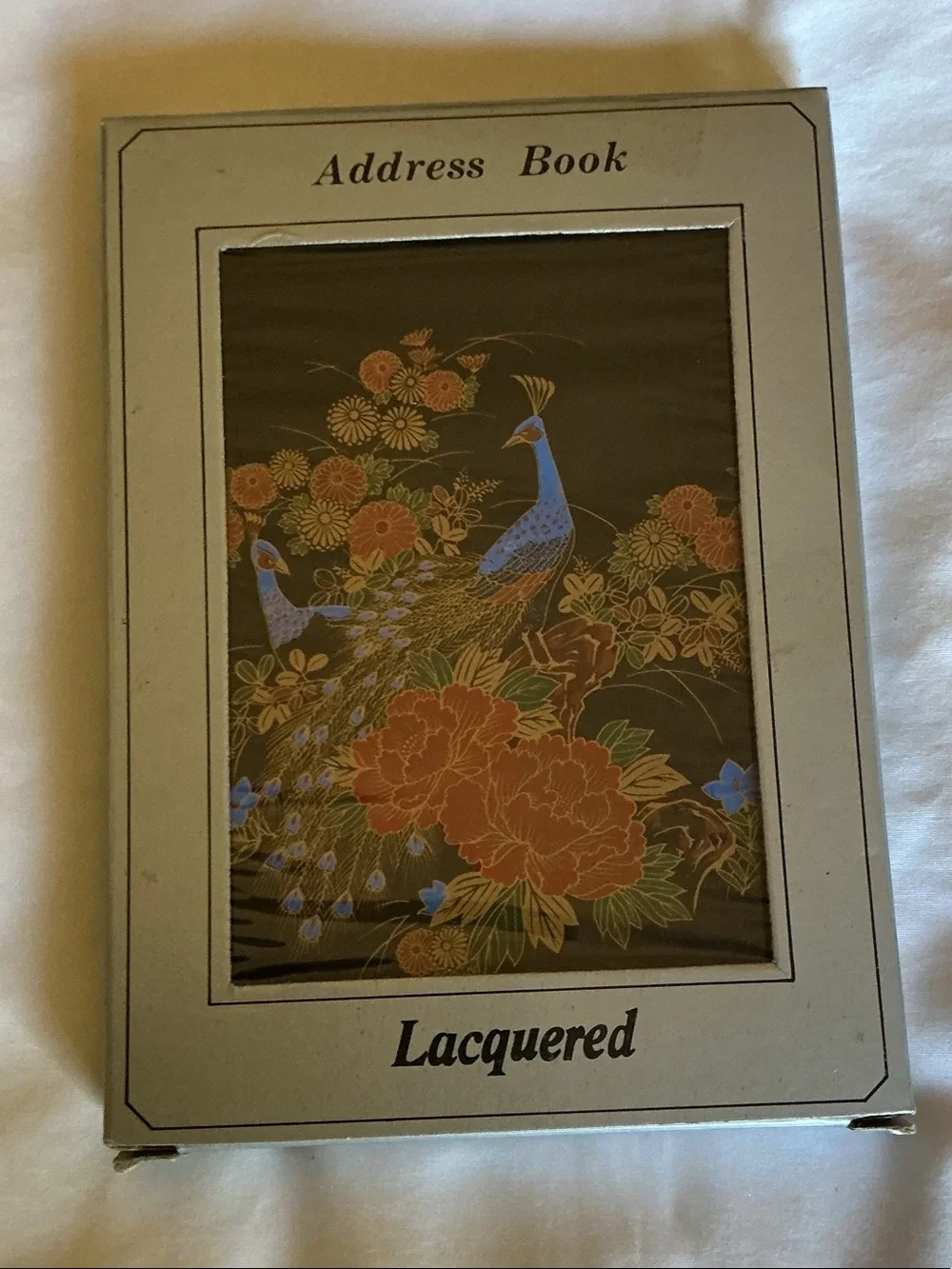 Lacquered Address Book with Blue and Orange Peacock Design
